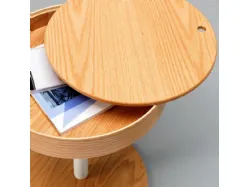 Tavolino Secret con top estraibile in legno curvato e struttura in metallo verniciato di Stones