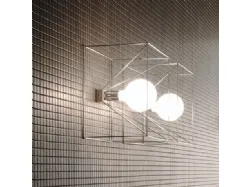 Applique di design in metallo con lampadina sabbiata Reflex di Adriani e Rossi