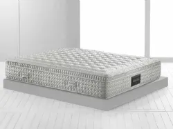 Materasso Maestro Dual 14 con lato invernale in cashmere e lana e lato estivo in seta e lino di Magniflex