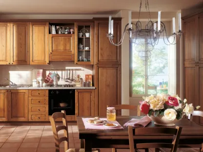 Cucina di pregio in massello di castagno, alternanza di ante chiuse e cassetti, 2 vetrine, cappa di design, Diana di S75